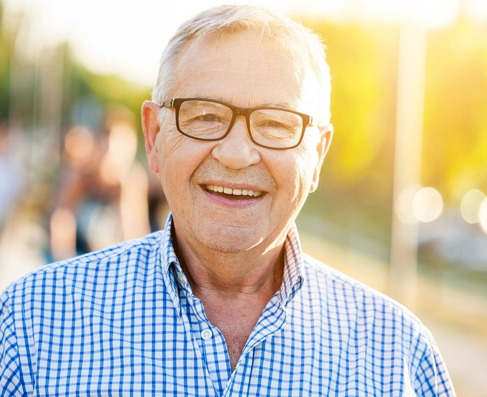 Smiling old man with eyeglasses